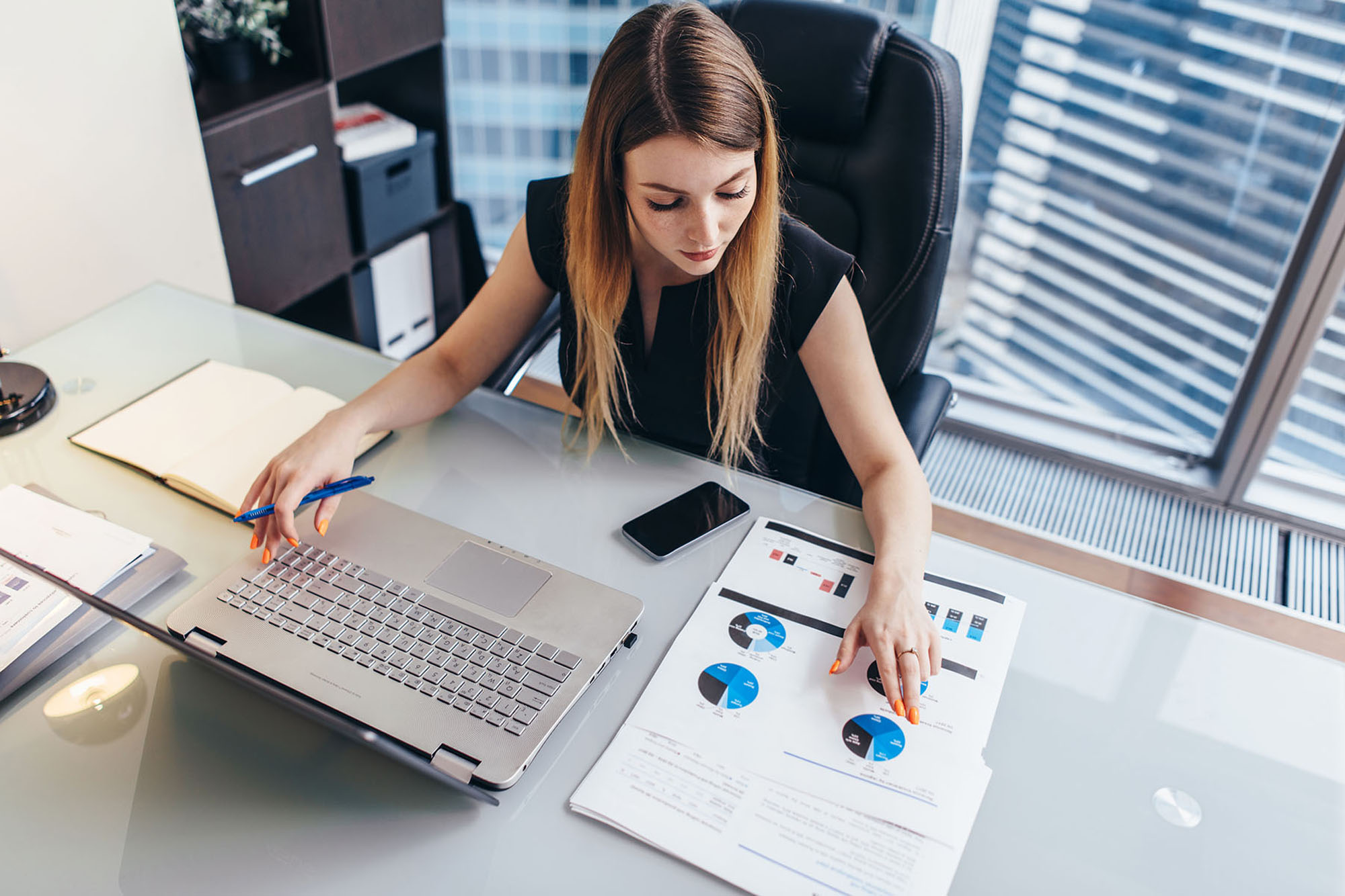 A business owner reviewing financial reports